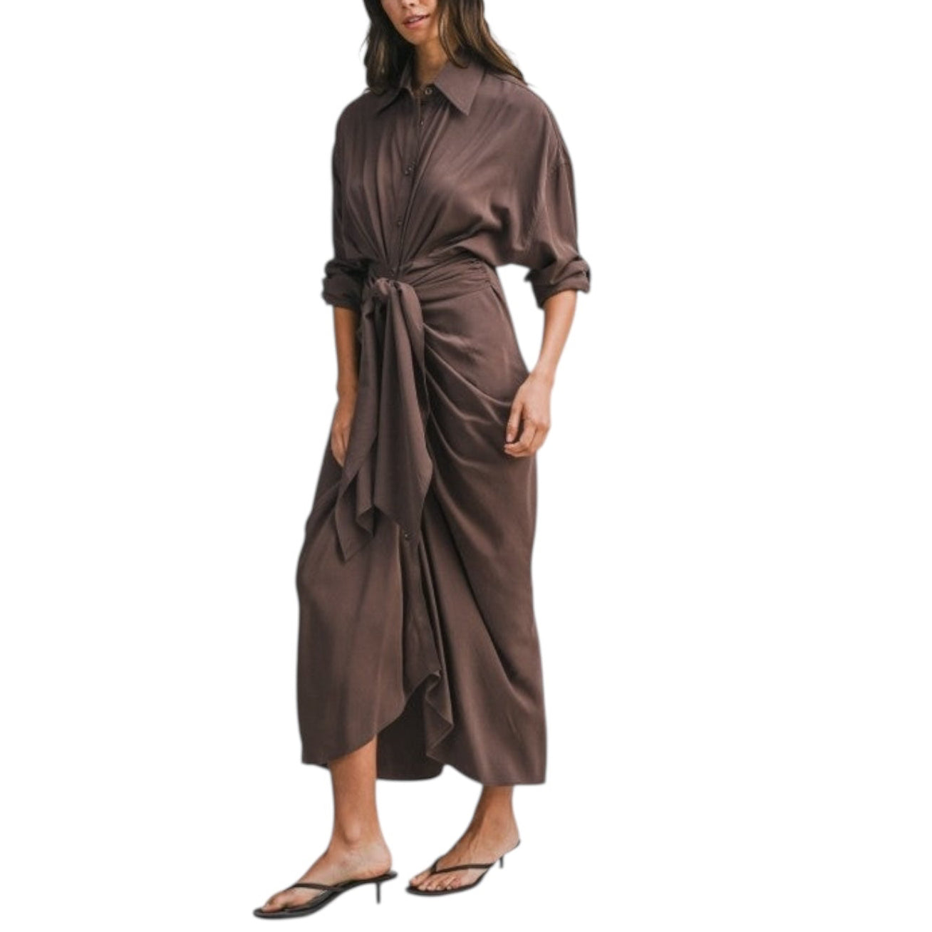 Woman wearing a brown satin dress on a white background