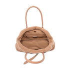 Beige handbag with fur trim on a white background