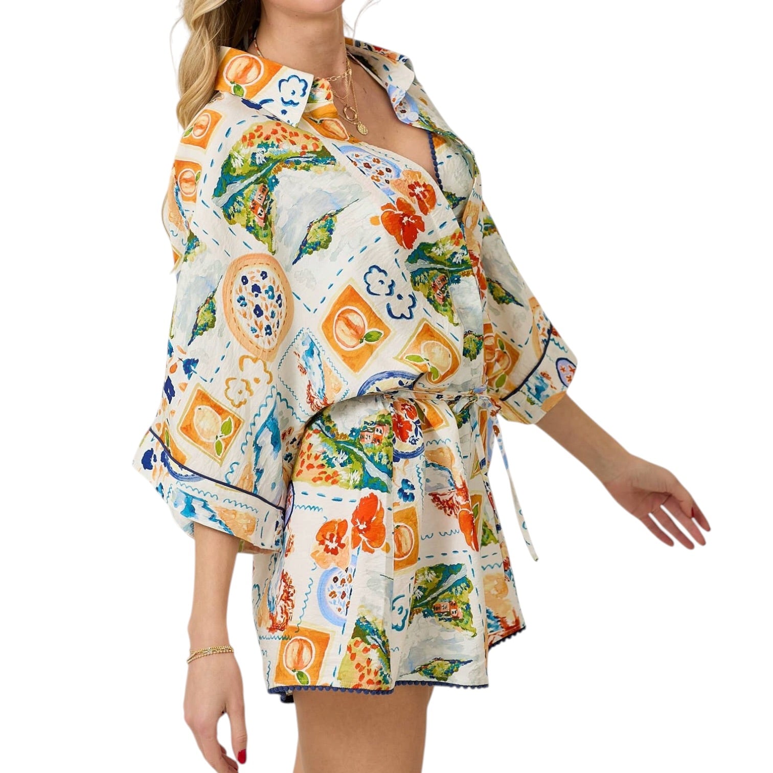 Colorful patterned romper on a white background