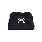 Black fluffy pouch with a white bow on a white background