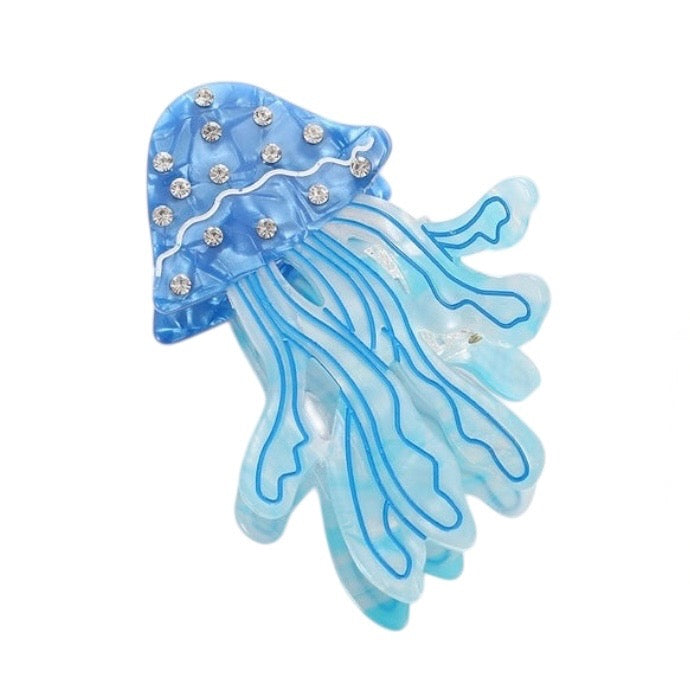 Blue jellyfish-shaped hair clip with rhinestones on a white background