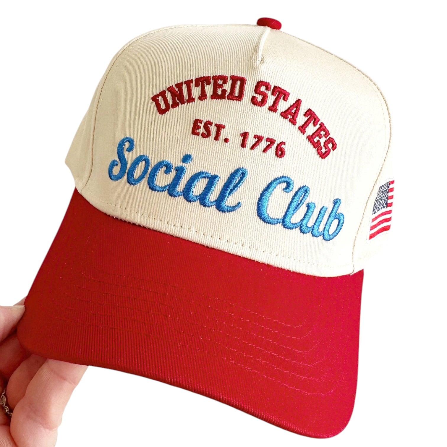 Cap with 'United States Social Club' text and American flag on a white background