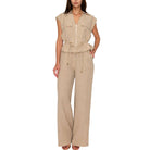 Woman wearing a beige set on a white background