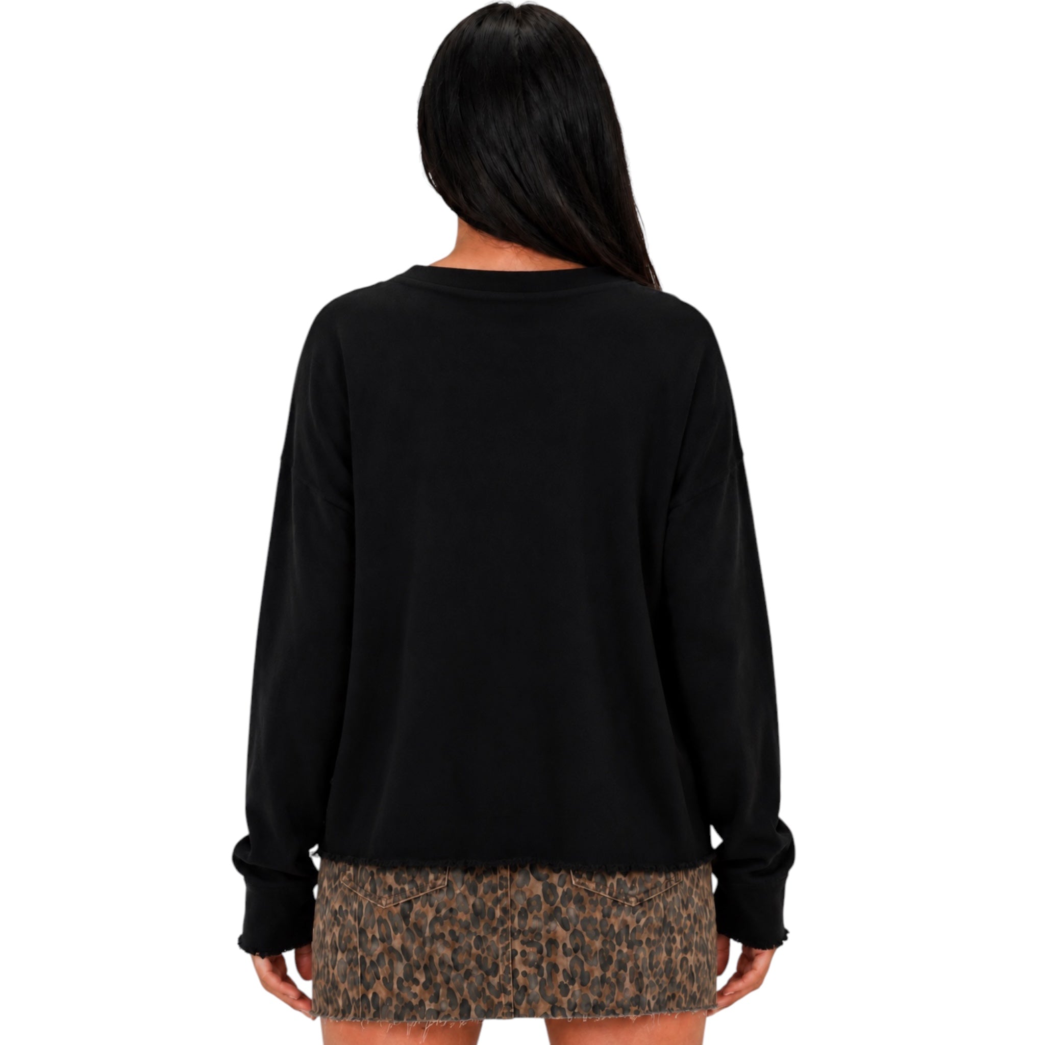 A woman shown from the back wearing a black long-sleeve crewneck sweatshirt and a brown leopard-print mini skirt against a plain white background.