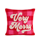 A square throw pillow featuring a red and pink buffalo plaid pattern with 'Very Merry' written in large, cream-colored cursive text across the front, set against a plain white background.
