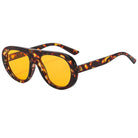 yellow leopard oval sunglasses on white background