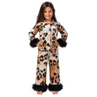 A young girl modeling a leopard print pajama set with black faux fur trim on the cuffs and hem, standing against a plain white studio background.