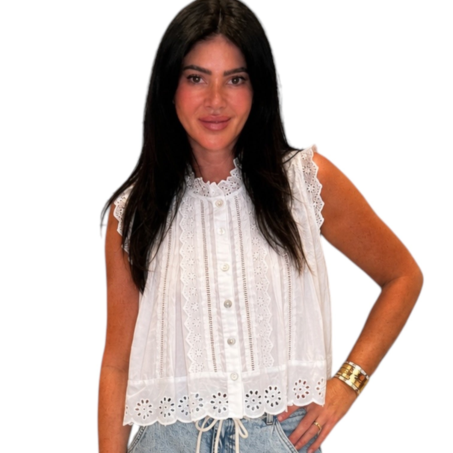 a woman wearing a white eyelet button down tank top on white background
