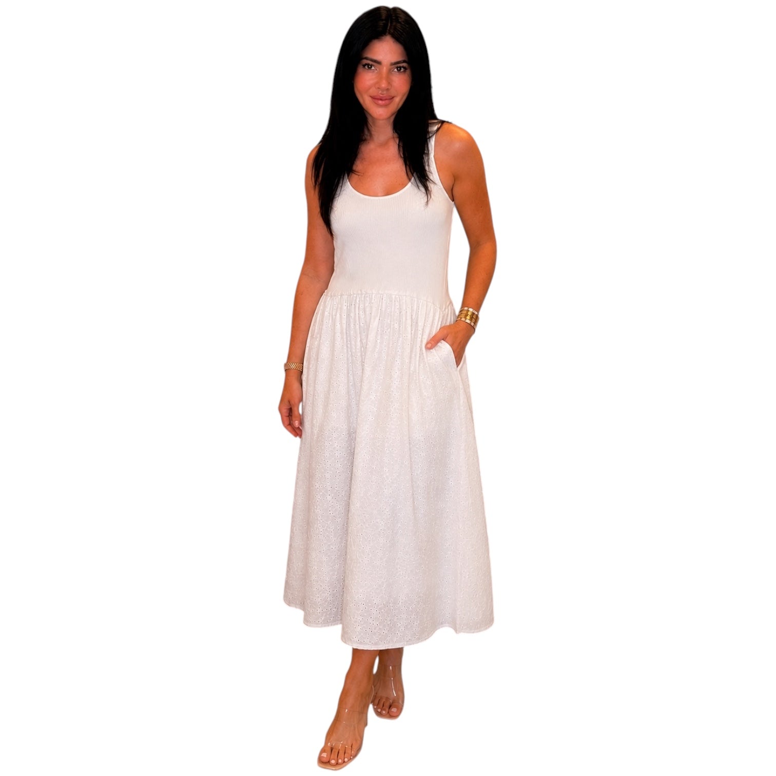 Woman wearing a white dress on a white background
