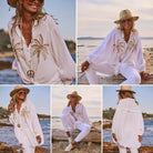 Woman in a white outfit with palm tree designs on a beach
