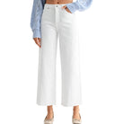 White wide-leg jeans worn by a person on a white background