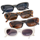 Four pairs of sunglasses with different frame colors on a white background
