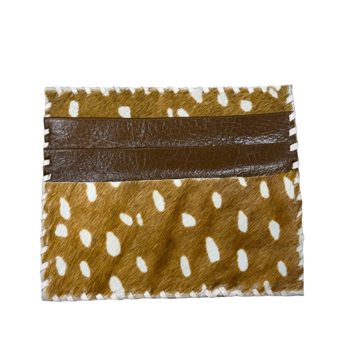 A rectangular patchwork leather and hide accessory, featuring a central dark brown faux-leather stripe flanked by brown and tan animal-print panels with white spots and a white stitched border, shown on a plain white background.