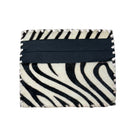 A square leather accessory with a black and white zebra print pattern and a wide black horizontal band across the center, shown on a plain white background.