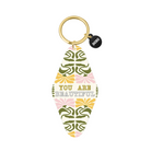 Keychain with floral design and 'You Are Beautiful' text on a white background