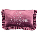 A dusty rose velvet clutch pouch with ruffled trim on all sides, featuring the text 'YOU CAN'T AFFORD ME ME' in white capital letters on the front.
