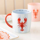 Mug with red lobster design and 'You Are My Lobster' text on a light background