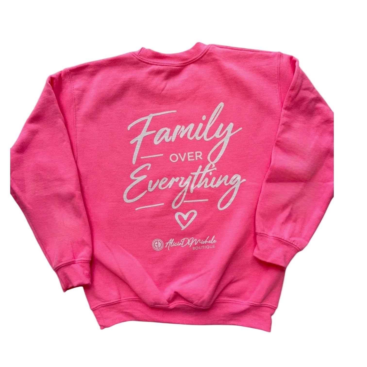 Pink sweatshirt with 'Family Over Everything' text on a white background