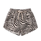 Zebra print shorts with a beige drawstring waist, displayed flat against a solid white background.