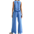 Blue set with lace details on a white background