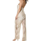 Cream lace set worn by a model on a white background