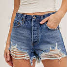 Mid-Rise Distressed Denim Shorts available at Alicia DiMichele Boutique – stylish women’s fashion and accessories.