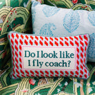 Fly Coach Needlepoint Pillow available at Alicia DiMichele Boutique – stylish women’s fashion and accessories.