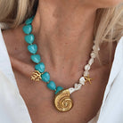 Snail Shell Luxe Necklace available at Alicia DiMichele Boutique – stylish women’s fashion and accessories.